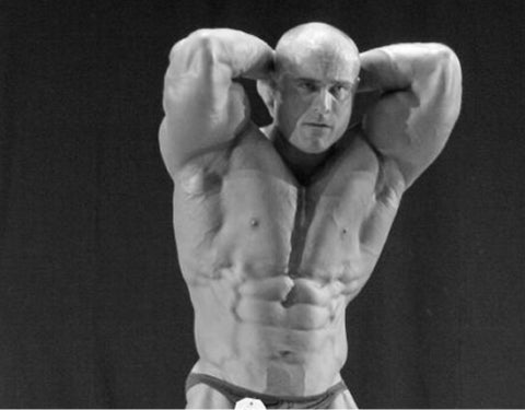 Male bodybuilder showing muscle